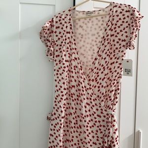 Super cute brand new wrap dress never been worn